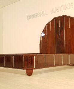 Art Deco Bett, Palisanderholz, breite Vierkantfüße, signiert Majorelle, konisch zulaufend, polygonales Kopfende, abgewinkelte Ecken