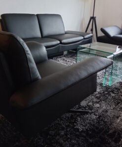 Black Leather Sofa, Carpet, Glass Coffee Table