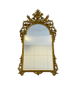 This large, gold-colored wall mirror impresses with its extraordinary carvings. It fits ideally in large corridors and reception halls or, for example, antique-style dining rooms. The mirror has hardly any / only slight signs of wear and is in excellent condition.