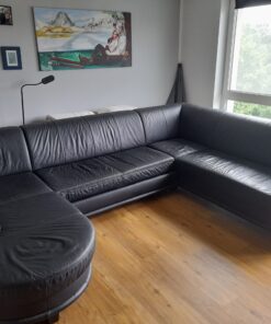 Schwarze Ledercouch in U-Form mit ausziehbarer Liegefläche in super Zustand